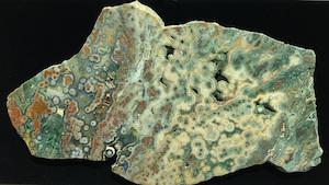 Hyper-heterogeneous slab from Vein 1/2 with mixed translucent and crystalline quartz areas, cut by ORCA, ~12in wide