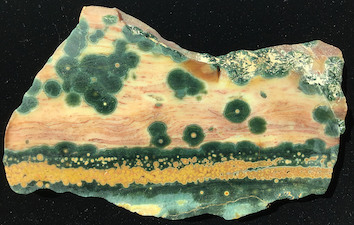 'Wild West': Side 1 of a slab specimen from Marovato Deposit/vein 1. This type of Ocean Jasper is among the earliest mined from Marovato. ~11cm wide.